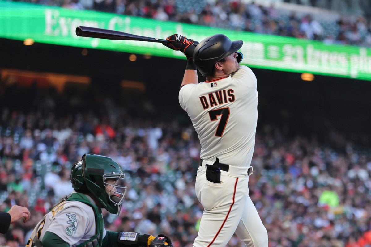 SF Giants third baseman J.D. Davis (7) hits a two-run home run at Oracle Park (2023)